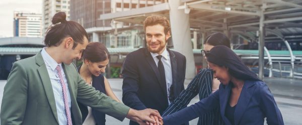 Close up of business people hands together. Teamwork concept.